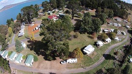 View of Rainbow Pines Tourist Caravan Park, Old Adaminaby, from the air